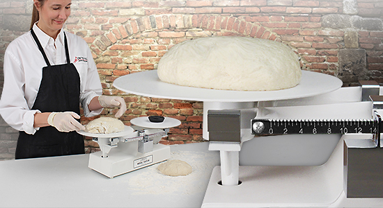 Baker Weighing Dough On Kitchen Scale Stock Photo 1646504854